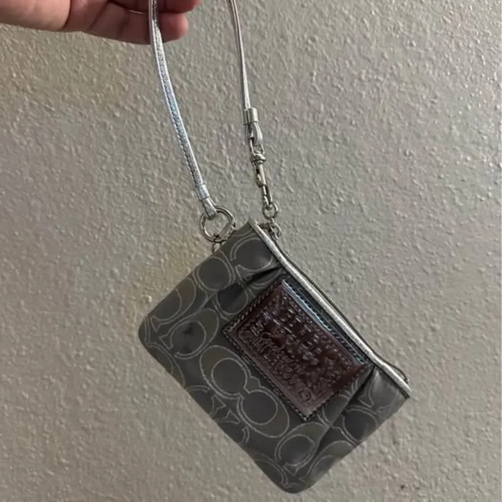 Coach Poppy Metallic Wristlet
